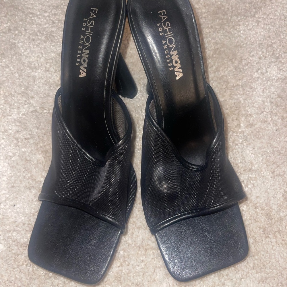 Black heeled mules